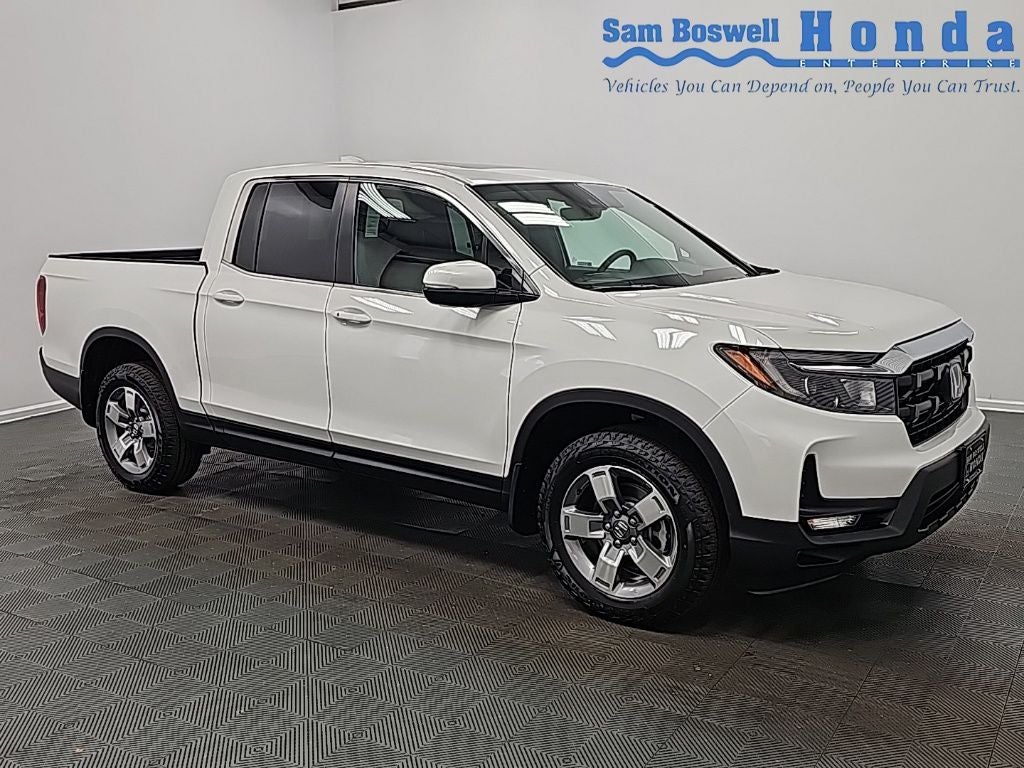 2026 Honda Ridgeline RTL in Platinum White Pearl — front three-quarter view